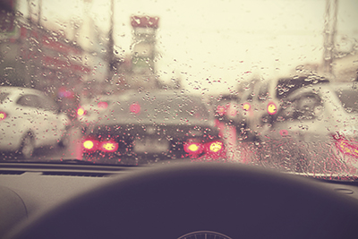 Driving on a rainy in a city, view from inside - Vintage effect style pictures